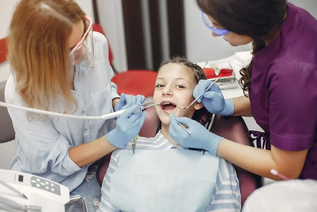 Child dental check-up by doctors